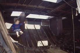 Roxanne inspects progress in the aft cabin