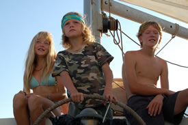 The Schinas kids sailing Mollymawk